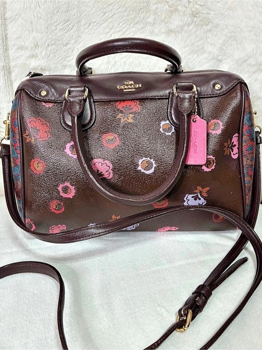 dark brown Coach Mini Bennett Satchel in the primrose floral print with pink and